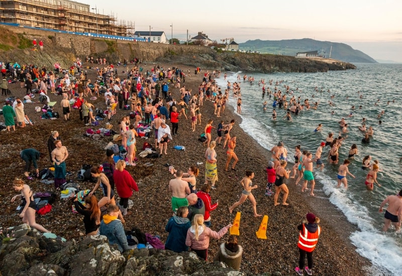 people on greystones beach