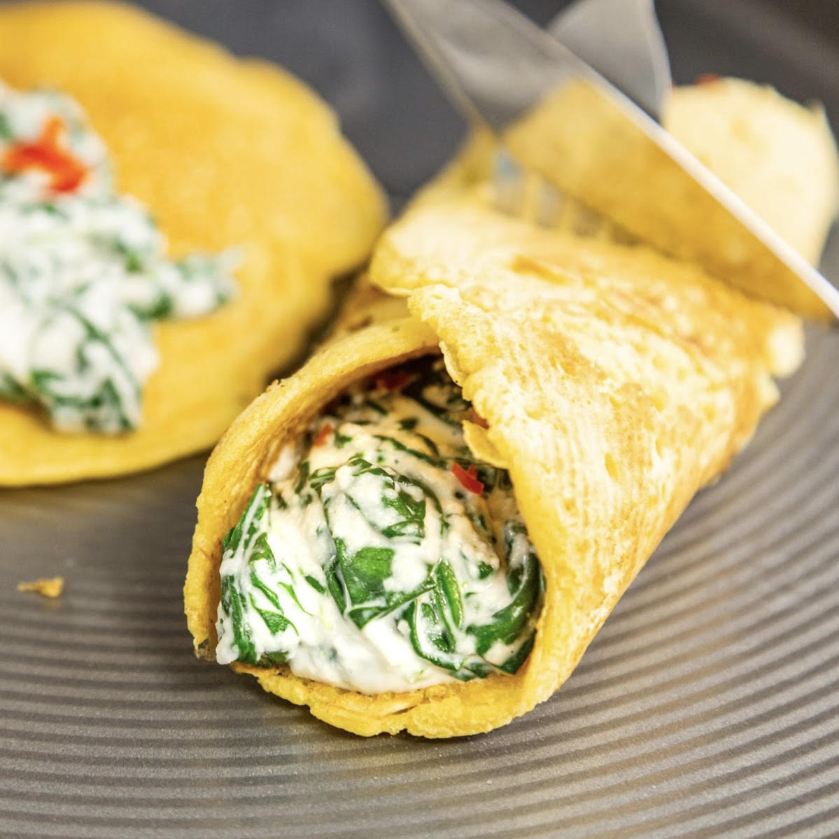 An image of Creamy spinach and ricotta pancakes