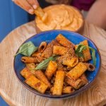 An image of Crispy Pasta Chips and Roasted Red Pepper Dip
