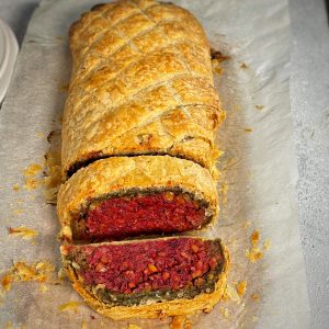 An image of Beet Wellington with a duxelle & spinach pancake