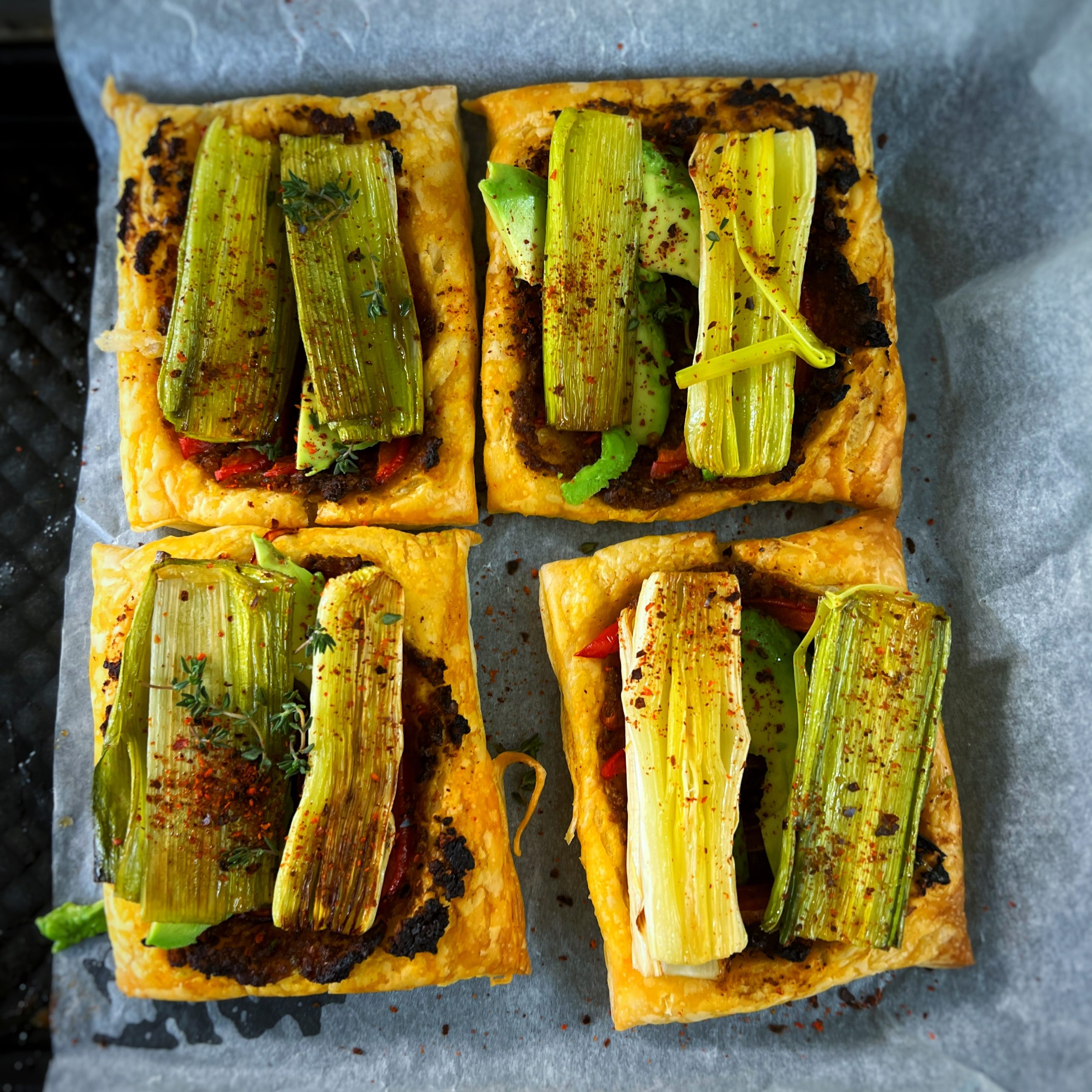 An image of Baked leek open topped pastry with pesto