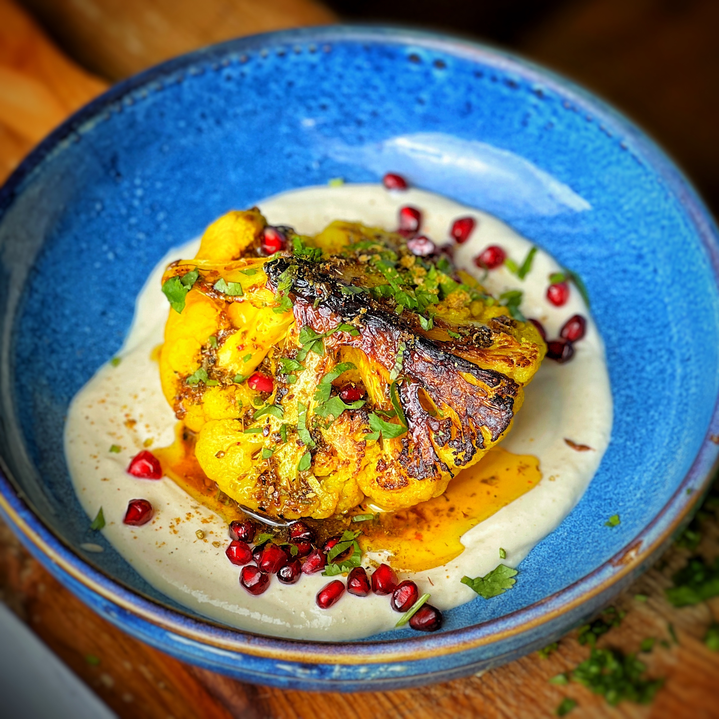 An image of Za’atar charred Cauliflower with Tahini cream