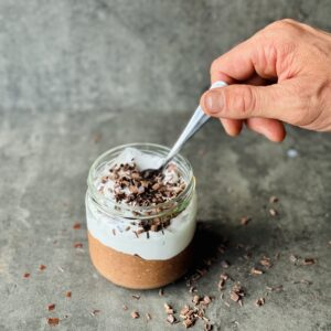 a photo of chocolate brownie overnight oats in a jar