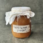 a photo of a jar of Easy Homemade Apple Scraps Vinegar