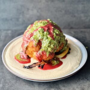 a photo of Whole roasted Cauliflower with Cranberry Glaze