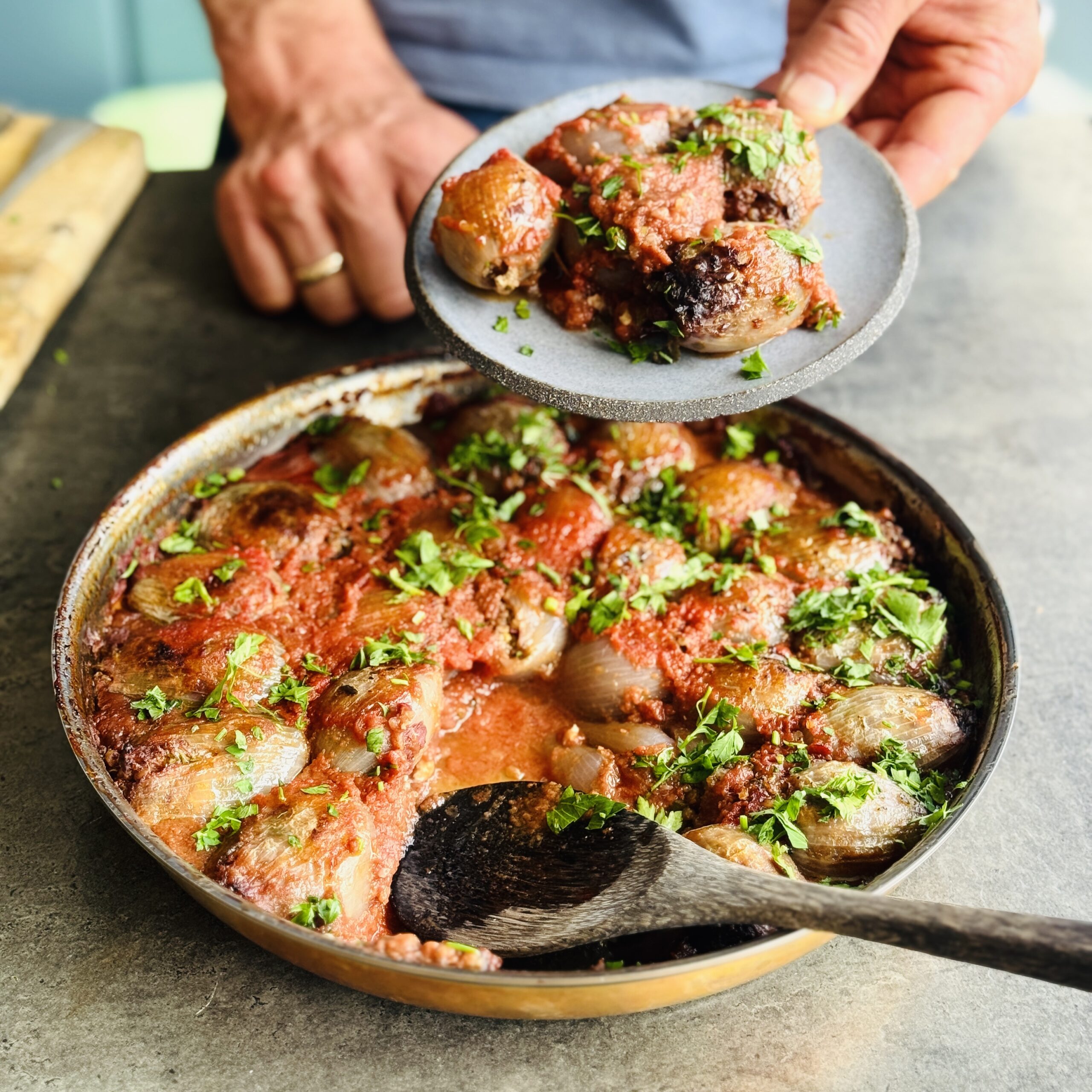 a photo of a dish of Baked Stuffed Onions (Salantourmasi)