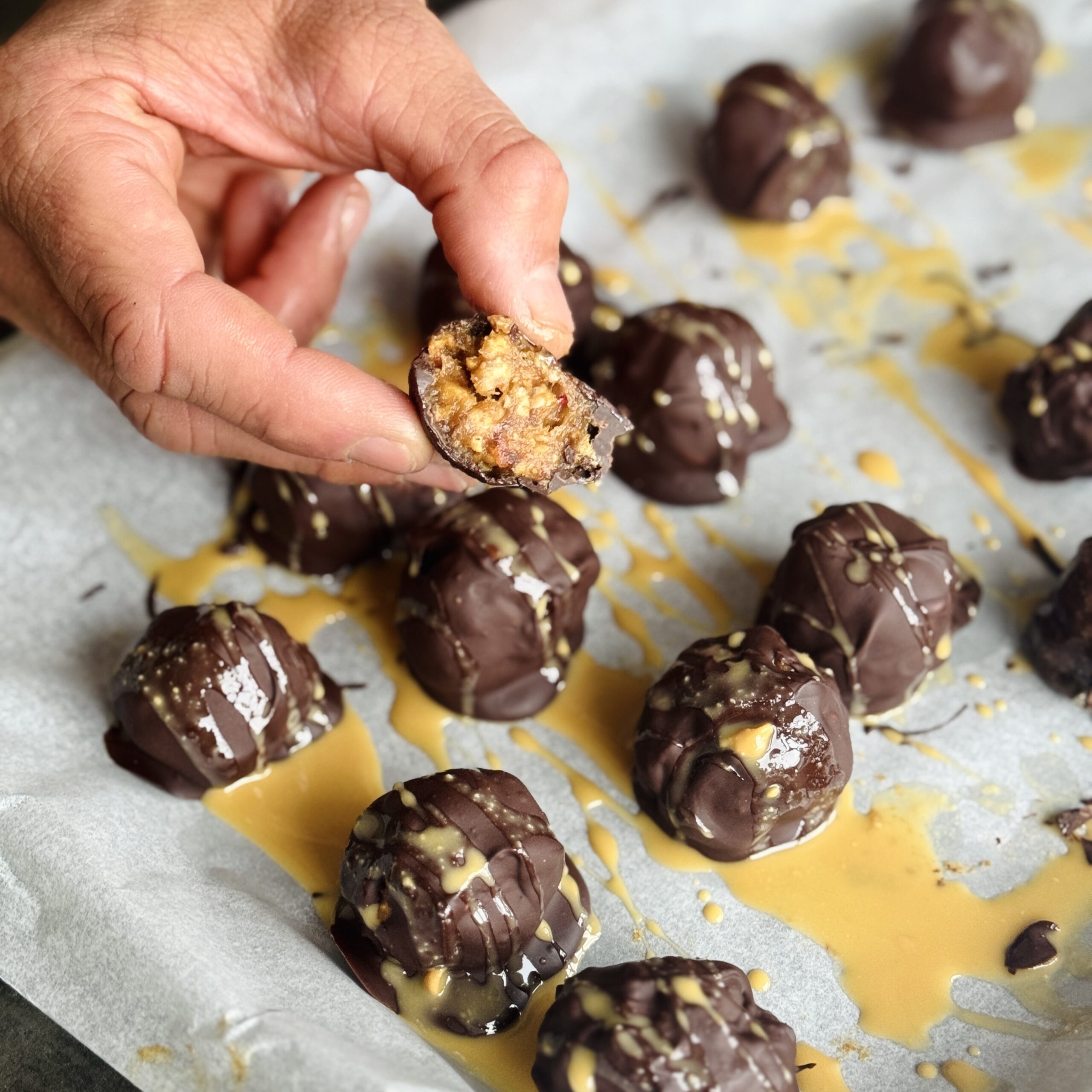 a photo of a tray of Crunchy Granola Clusters with Chocolate Coating