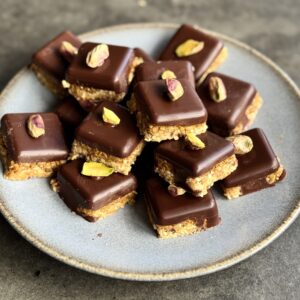 a photo of a plate of Dubai-Style Chocolate Pistachio Squares