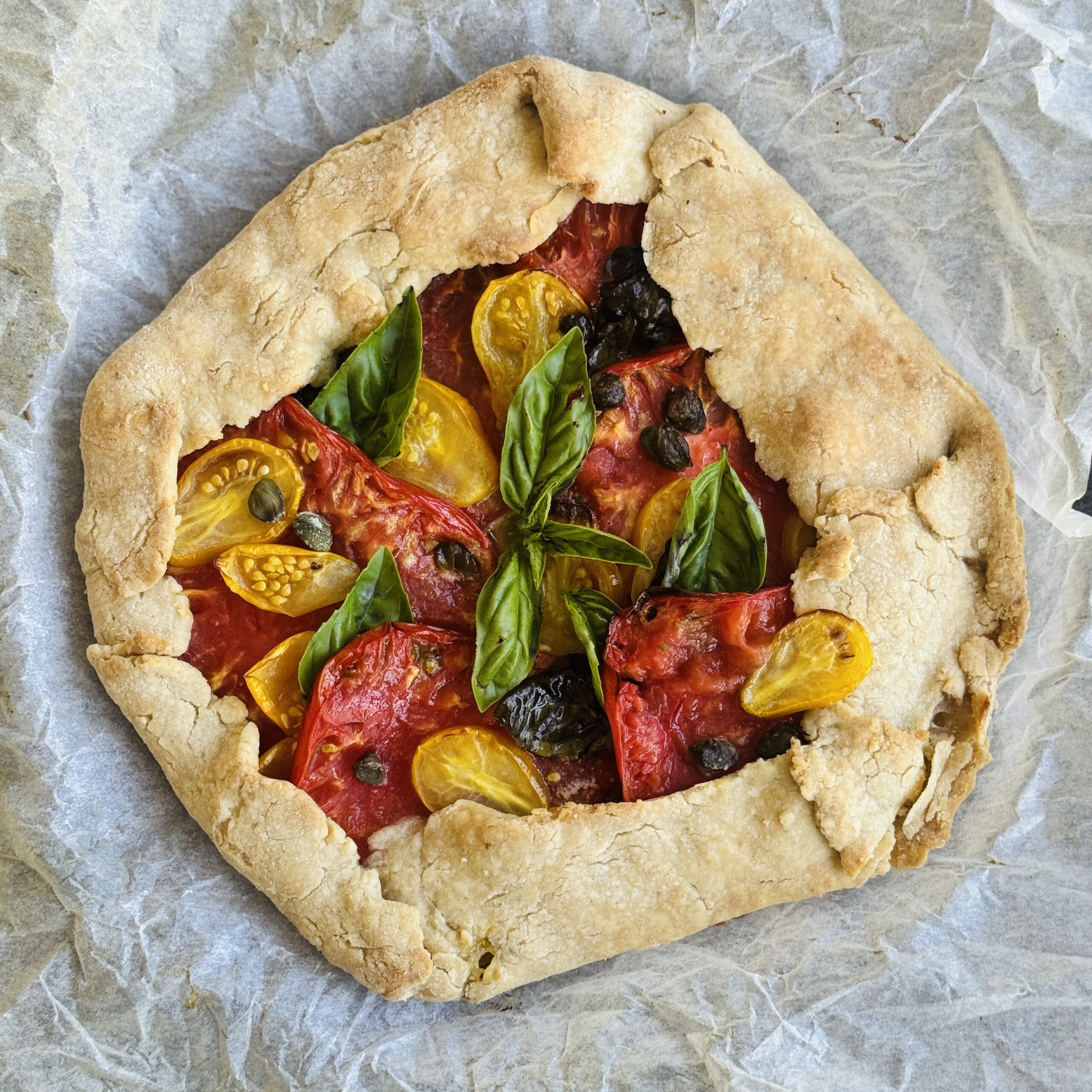 a photo of Summer Heirloom Tomato & Basil Galette