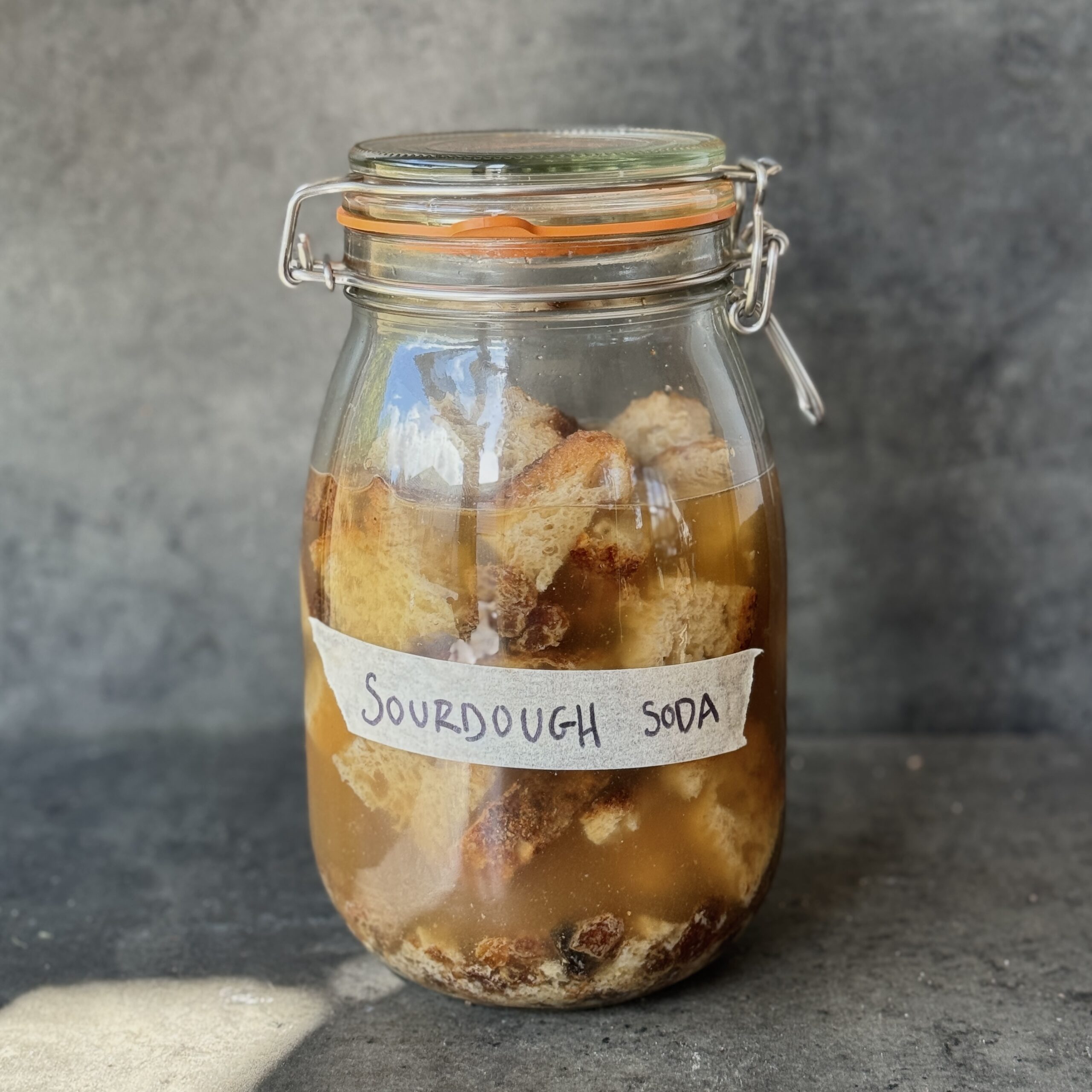 a photo of a jar of Sourdough Soda with Cinnamon & Raisin