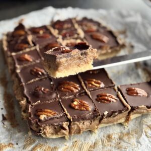 a photo of No Bake Chocolate Caramel Pecan Pie Bars