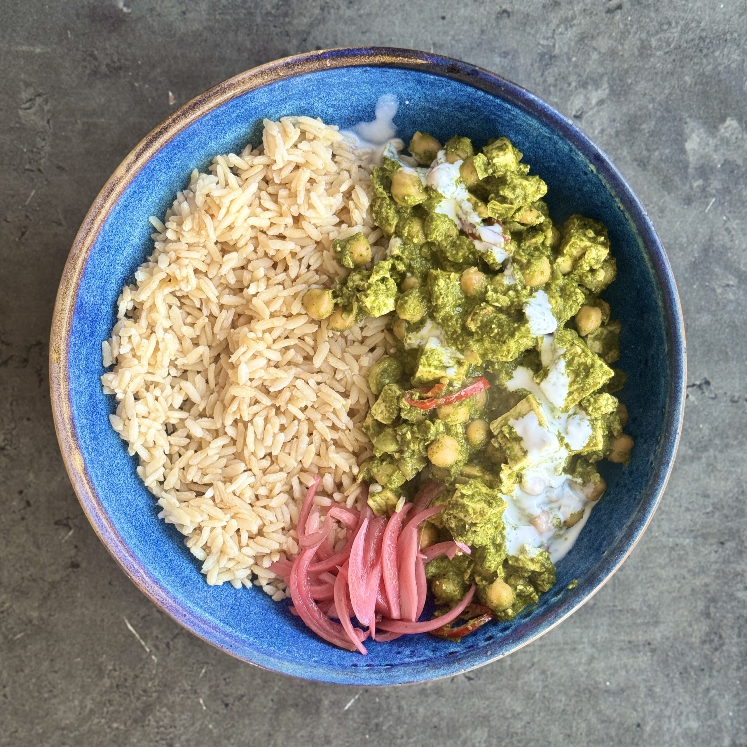 a photo of Spinach Chickpea Paneer
