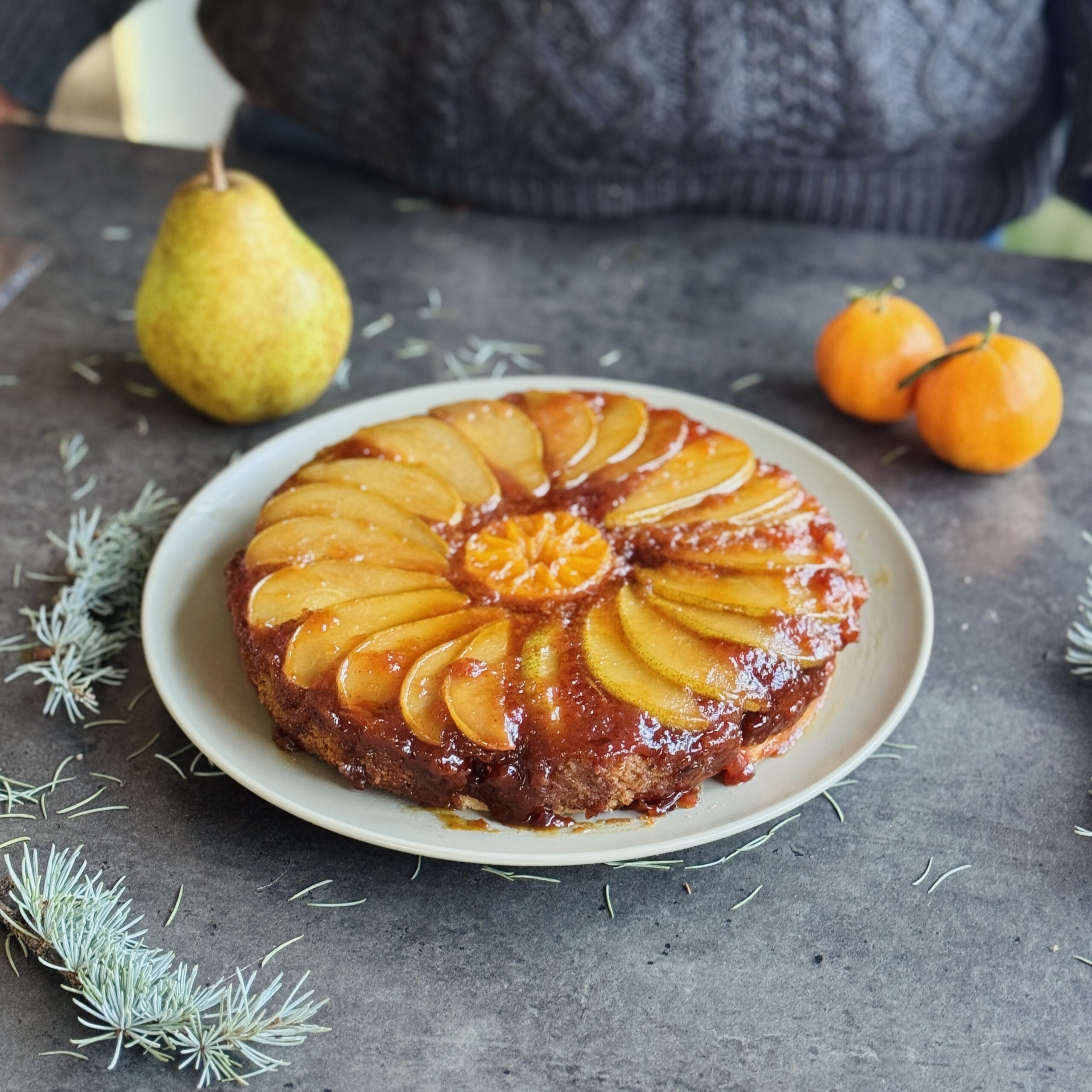 a photo of Sticky Upside-Down Gingerbread Cake with Pear, Pecan & Pastry